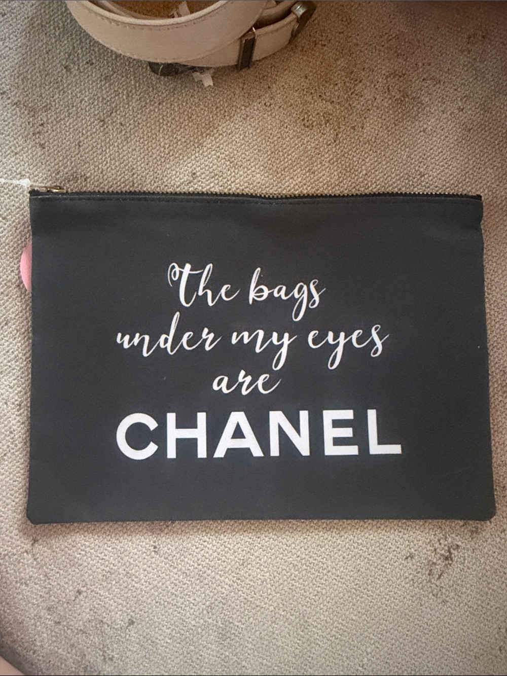 Black Canvas Pouch with White CC Logo bags under my eyes